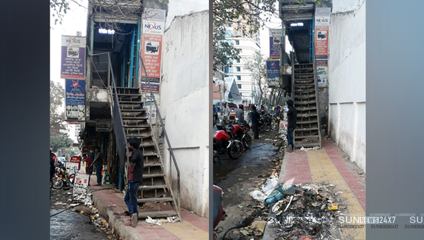 ফুটপাতটি  উঠে গেল সোজা দোতালায়।       
ছবি: ঢাকা বিশ্ববিদ্যালয় মার্কেট, কাটাবন