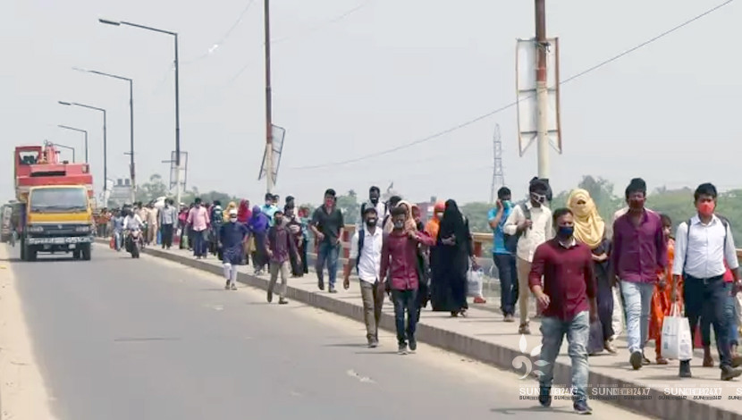 করোনাভাইরাসের আতঙ্ক উপেক্ষা করে ঢাকায় ফিরছেন দলে দলে গার্মেন্টস কর্মীরা