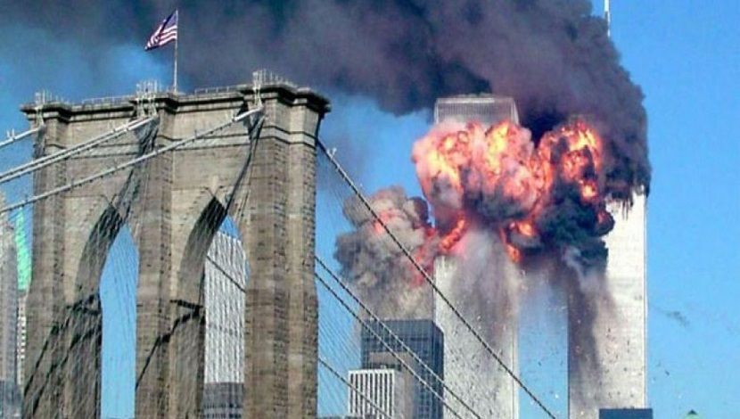 নাইন-ইলেভেনের হামলা-জ্বলছে ওয়ার্ল্ড ট্রেড সেন্টারের টুইন টাওয়ার। ছবি: রয়টার্স
